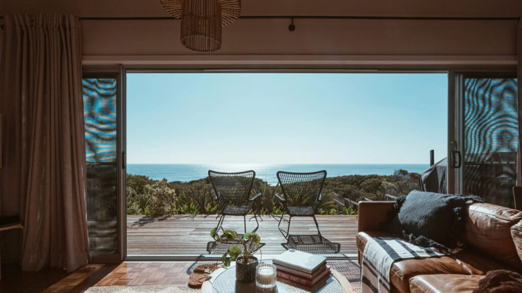View from the terrace of a modern villa overlooking the ocean. Source: Ben Mack, Pexels